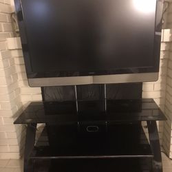 42 Inch Vizio Tv with table and remote