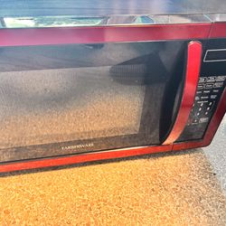 Red Microwave barely used  CASH Only