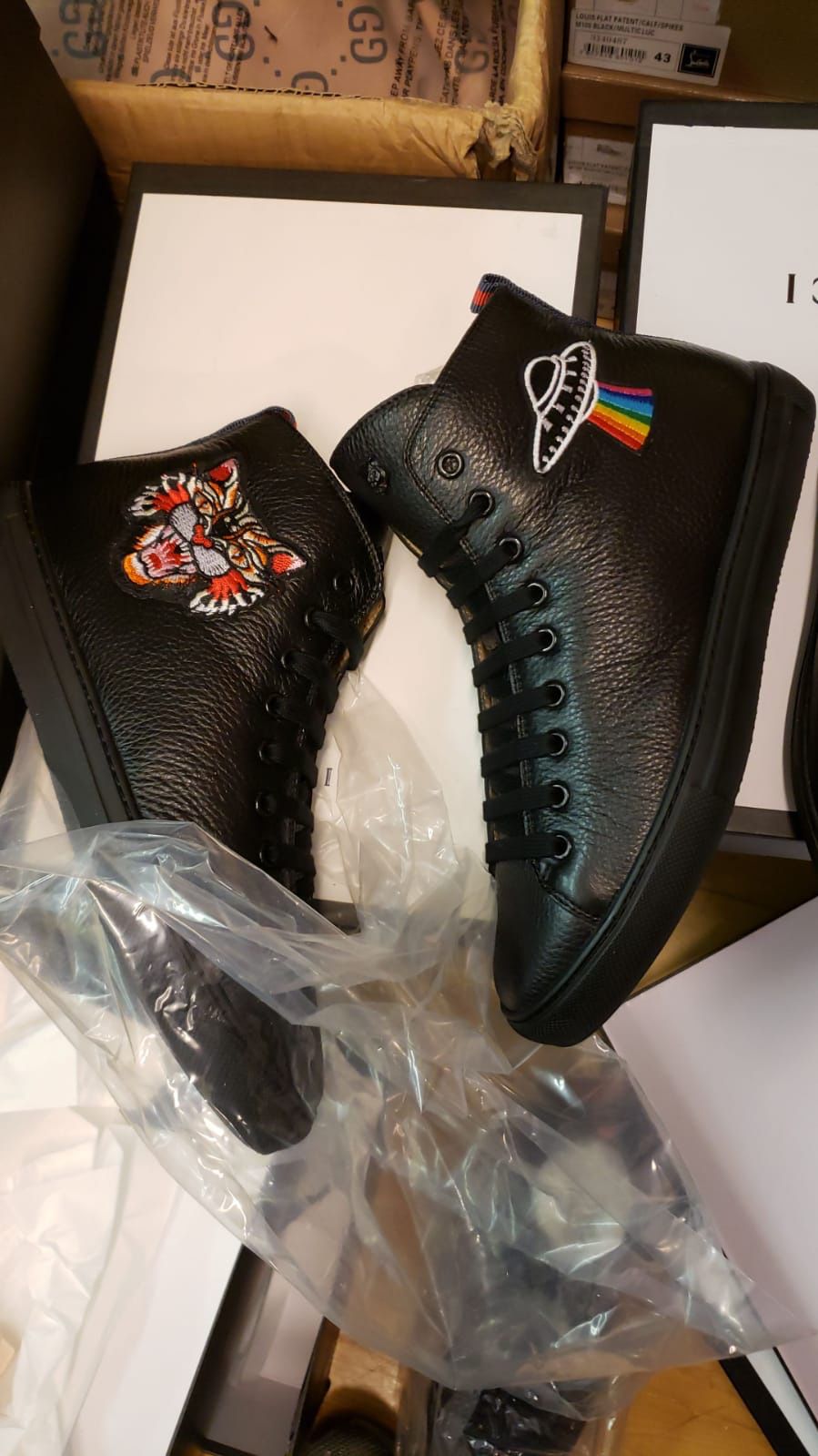 SIZE 44 Gucci high top sneakers.