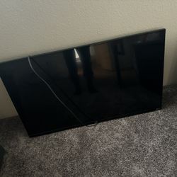 40 inch TCL ROKU TV  W/  TV STAND