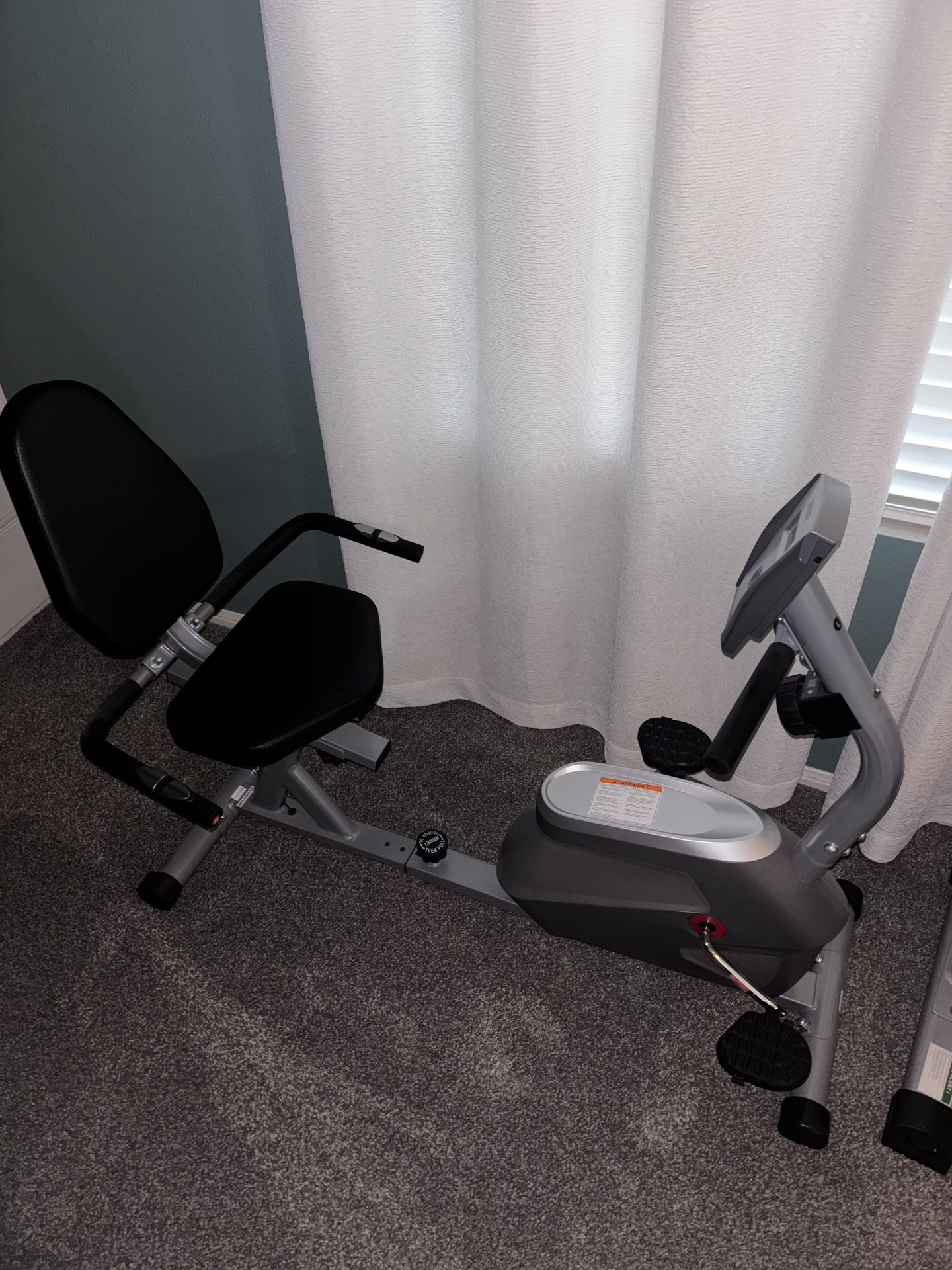 Sit down bike exercise machine