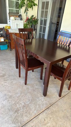 Small wooden table and 4 Chairs