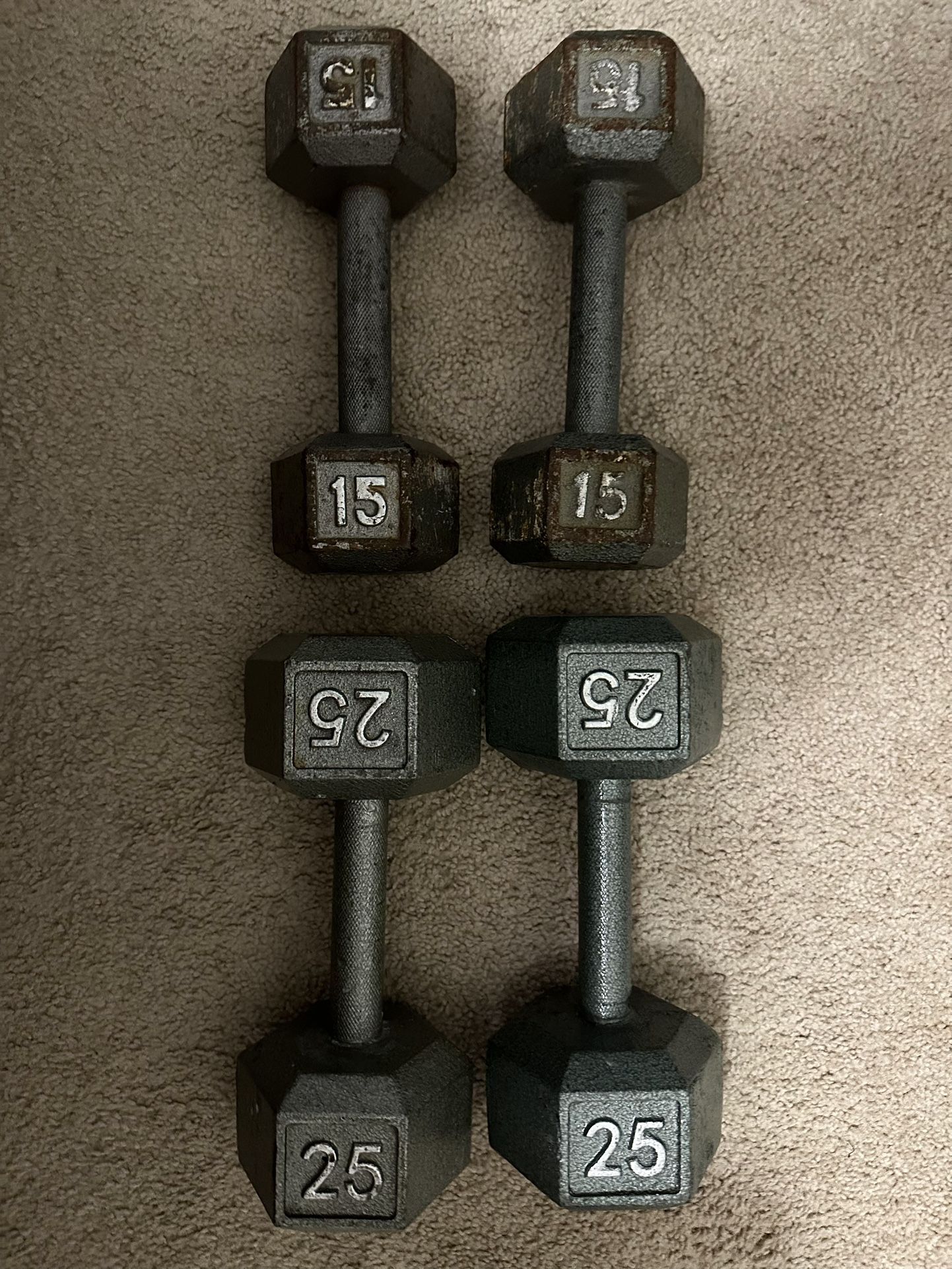 Two 15lb And 25lb Dumbbell Weights