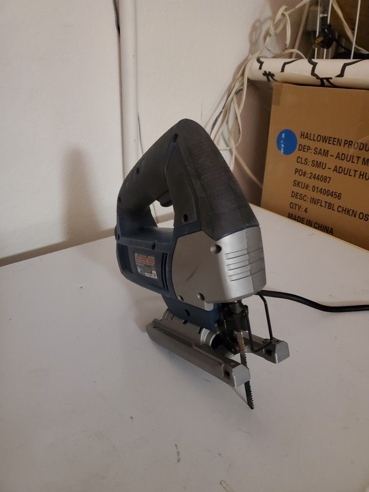 RYOBI ELECTRIC CORD 10" JIGSAW. STILL IN GOOD CONDITION. JUST DON'T NEED IT.