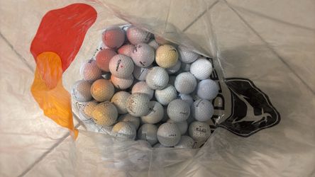 100 used golf balls