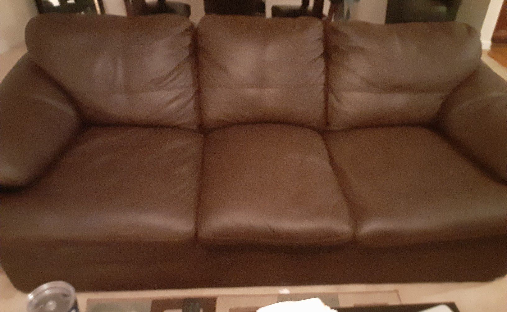 Brown leather sofa $250