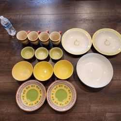 15 stonewares in the vibrant Pistoulet pattern by Pfaltzgraff, good condition, 4 mug cups, 6 bowls, 4 dishes, 1 large serving bowl, good