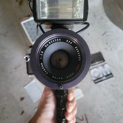 Olympus OM-2 With Panagor Lens, Flash, And Trigger