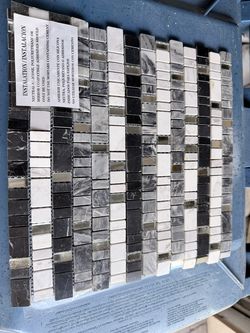 Marble, glass, and metal coverings Revestimientos mármol , vidrio , metal