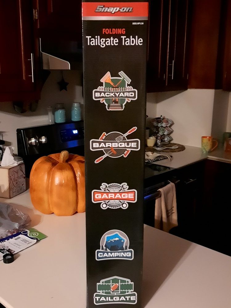 Snap on tailgate table