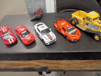 The 4 Sport Cars are Customized With NASCAR Stickers 