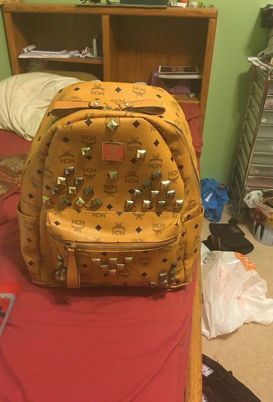 Real studded mcm medium backpack selling for the low