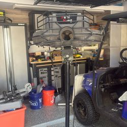 Fung-o-matic pitching machine