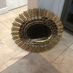 A gilt wood Starburst mirror Super Rare Going For Around 900