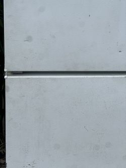 Use Stand Up Freezer And Small Refrigerator 