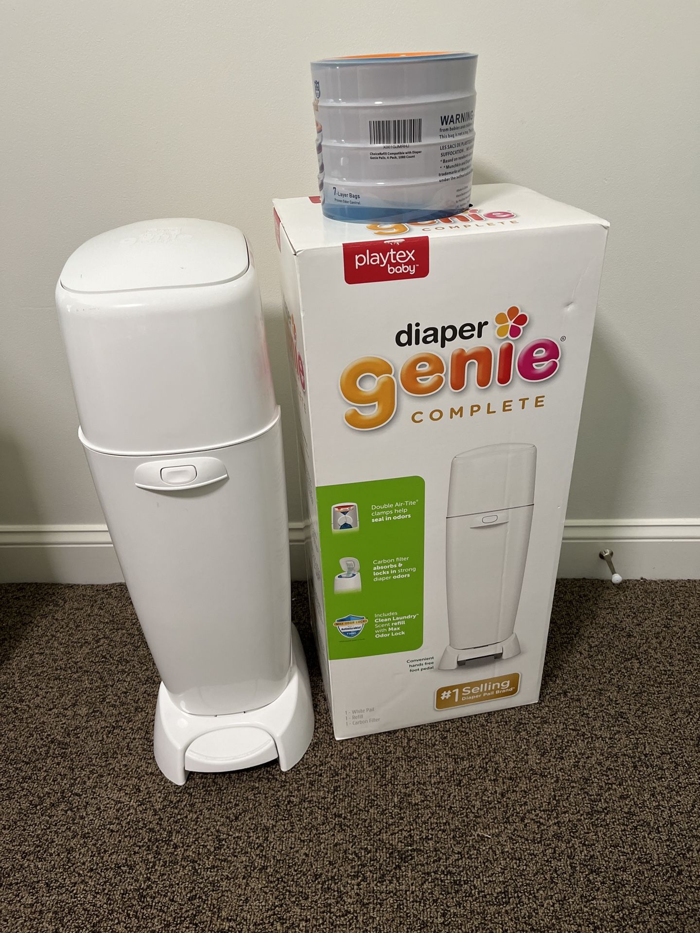 Diaper genie with refill packs