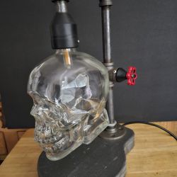 Lamp of a glass skull head