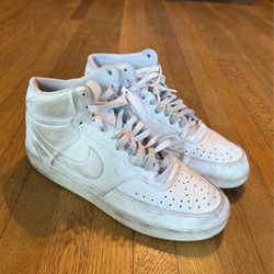 Men’s white Nike shoes