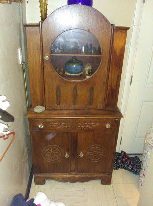 Antique Maple curio cabinet
