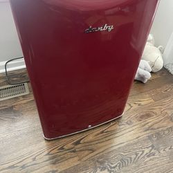 Red mini Fridge .. great for summertime come pick it up before it’s gone