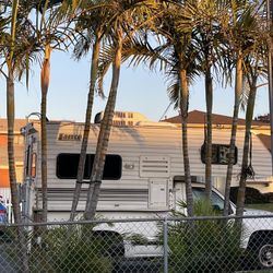 2002 Lance camper and 2000 Chevrolet 2500 V8 Truck 