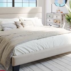 Platform bed with fabric upholstered headboard