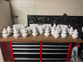 Collection Of White Pottery, Vases, And Planters