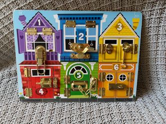 Melissa and doug wooden latches board