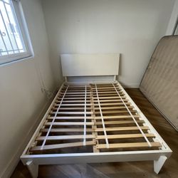 West Elm Wood Headboard/Bed frame works perfectly is a few years old