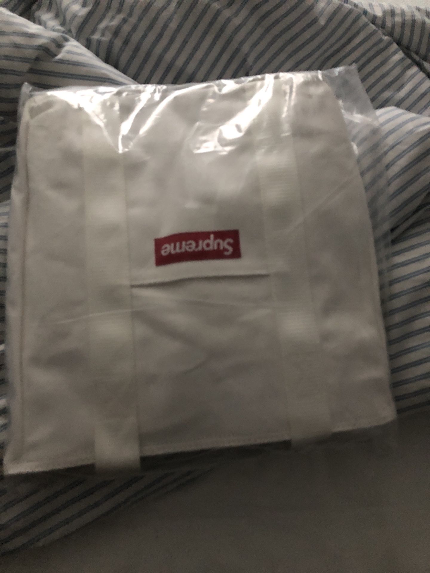 Supreme tote bag - never taken out of package. Trying to clean out inventory