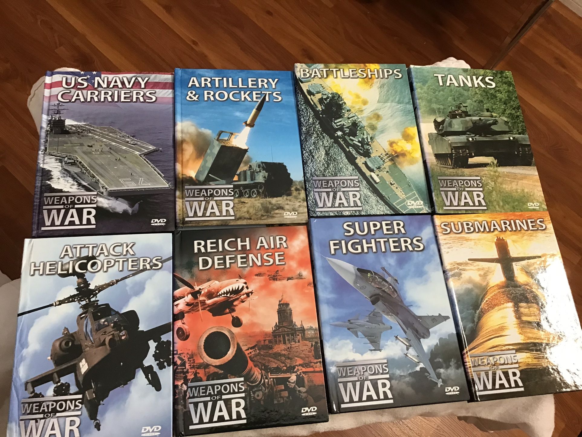8 COLLECTIBLE DVD’S WEAPONS OF WAR