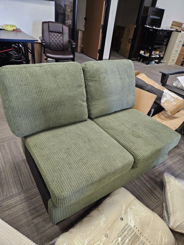 $50/ green loveseat chair. brand new. free one white chair. 