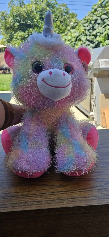 Fluffy Big Eyed Rainbow Unicorn Stuffed Animal