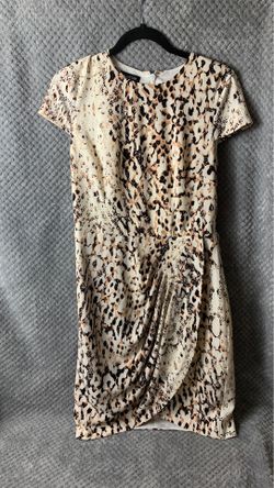 BEBE cheetah dress! Nice material and dress is like brand new