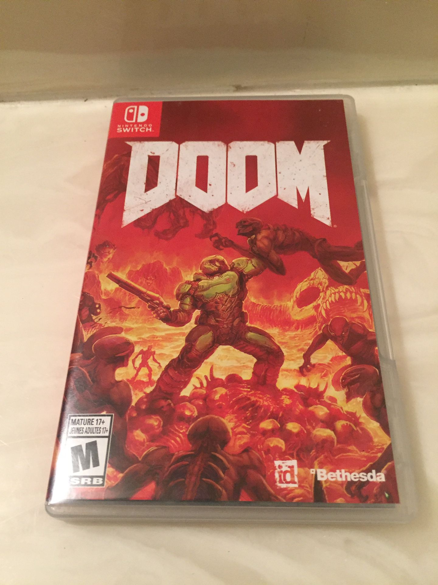Nintendo Switch Game : Doom (practically brand new with under 2 hours of gameplay)