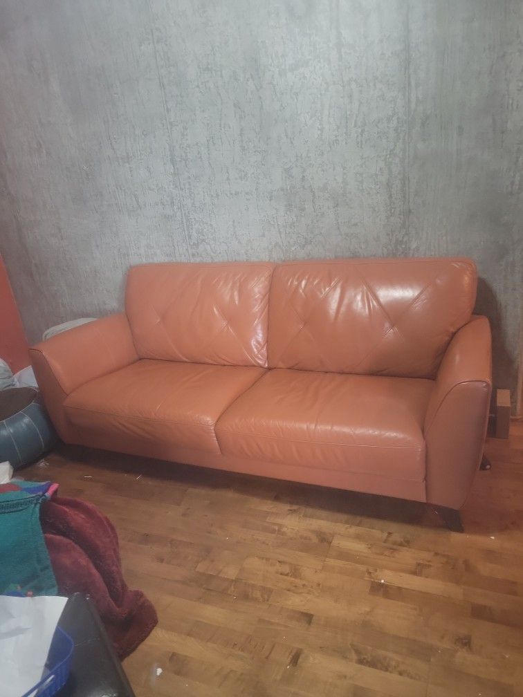 MCM terracotta leather sofa