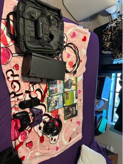 Xbox Series X Bundle: 5 Games, Headset, Controllers, Media Remote, Carrying Case
