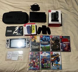 Nintendo Switch + Games + Cases + Dock + Controllers + Charging Dock