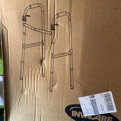 2 New Walkers In Box 