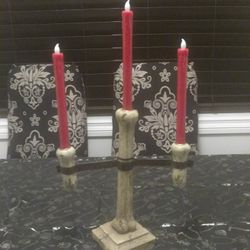 Candleabra of bones for 3 candles With Metal Bar