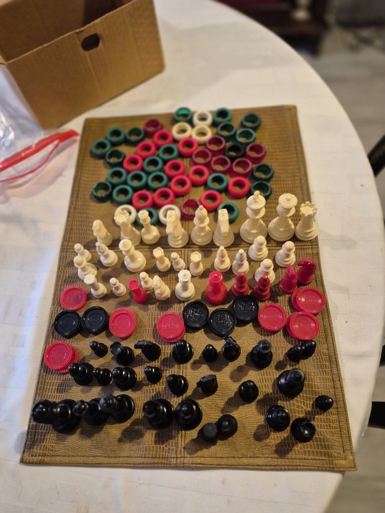 Chess checkers and other board game pieces
