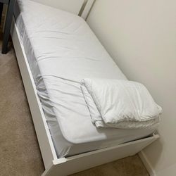 2 twin size beds and 2 mattress