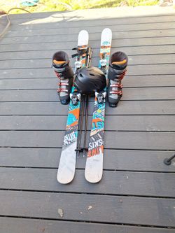 158cm line skis salomon boots 28.5 poles and helmet