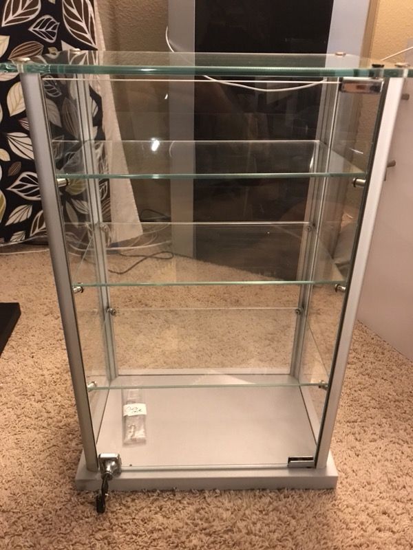 Glass display case 24x10 used great condition lock and key adjustable