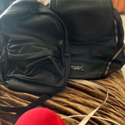 2 black mini backpacks 