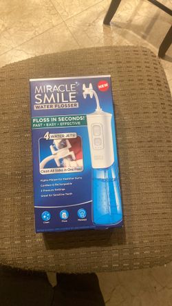 Miracle smile rechargeable flosser
