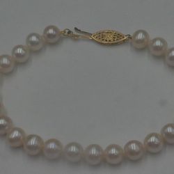 14kt clasp 7.5mm pearl bracelet 13.1 grams 886378-13