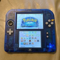 Nintendo 2DS Crystal blue w/ Pokémon alpha sapphire & Kirby game