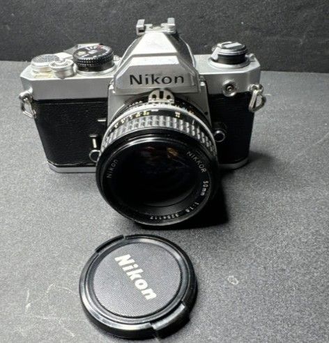 nikon fm silver 35mm film camera w/ nikkor 50mm lens japan
