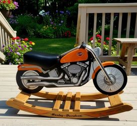 Rocking motorcycle shown is the KidKraft Harley-Davidson Roaring Softail Rocker